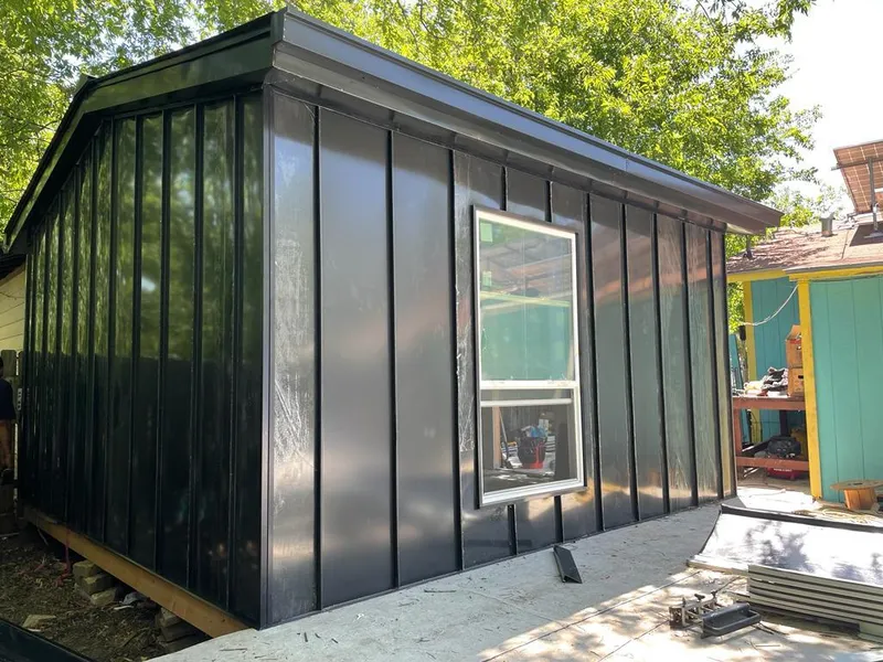 Black standing seam metal wall panels for Roof Inspection in Garden Grove