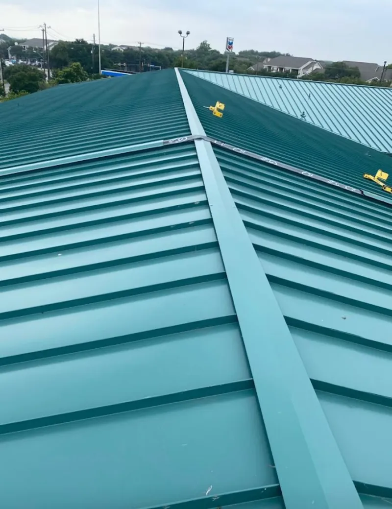 Green commercial metal roof ridge and valley for Metal Roof Repair in Garden Grove